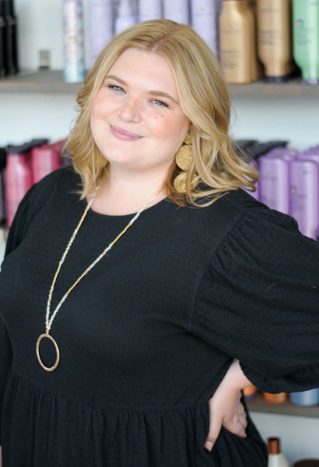 headshot of Hailie Poppell - Marketing Strategist & Boutique Coordinator